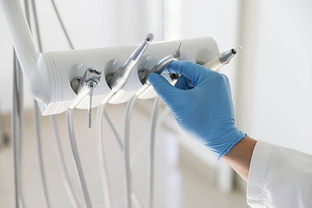 Professional Tooth Extraction technician working in Ellsworth, ME
